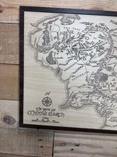 Load image into Gallery viewer, Wooden map of Middle-earth from 'The Lord of the Rings' on a wooden surface