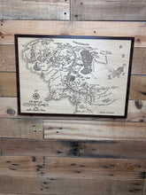 Load image into Gallery viewer, Map of Middle-earth with a Walnut Frame hanging on a wall