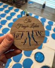 Load image into Gallery viewer, A hand holding a wooden