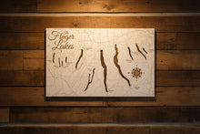 Load image into Gallery viewer, Map of the Finger Lakes hanging on a cabin wall