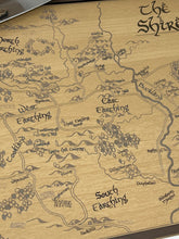 Load image into Gallery viewer, Map of The Shire from 'The Lord of the Rings' on a wooden surface