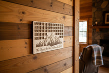 Load image into Gallery viewer, Adirondack 46 Peaks Challenge Mountain Tracker on a Cabin Wall